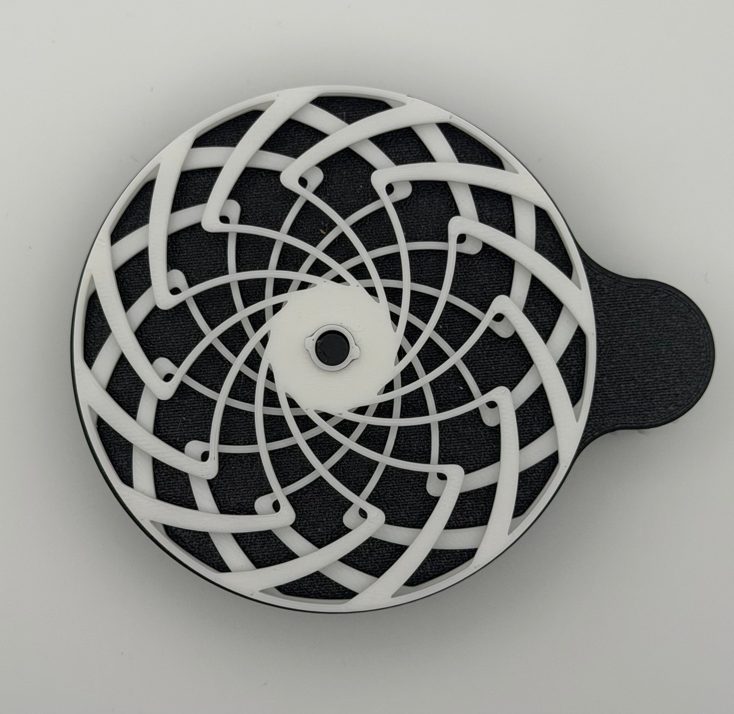 OPTICAL ILLUSION SPINNER